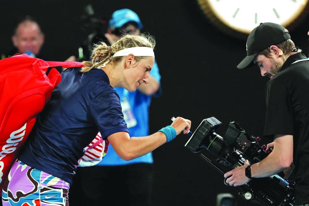 Belarus' Victoria Azarenka signs on the camera after the singles quarter-final match against Jessica Pegula of the US on day nine of the Australian Open in Melbourne on Tuesday. (AFP)