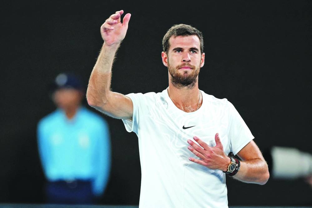 Russia’s Karen Khachanov celebrates victory against USA’s Sebastian Korda after their singles quarter-final match on day nine of the Australian Open in Melbourne on Tuesday. (AFP) 