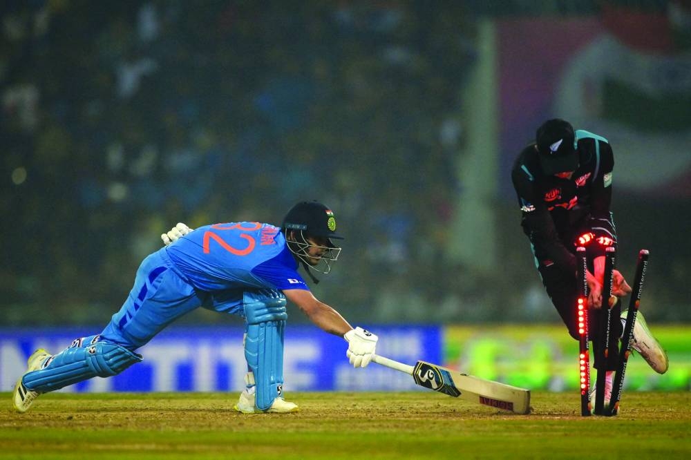 India’s Ishan Kishan (left) gets run-out during the second Twenty20 international against New Zealand at the Ekana Cricket Stadium in Lucknow yesterday. (AFP)