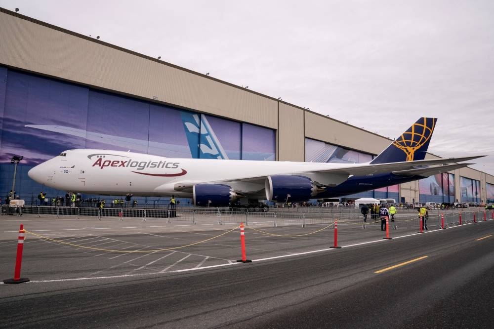 Boeing employees and members of the media attend the delivery of the final 747 jet at their plant in Everett, Washington, US, January 31. REUTERS