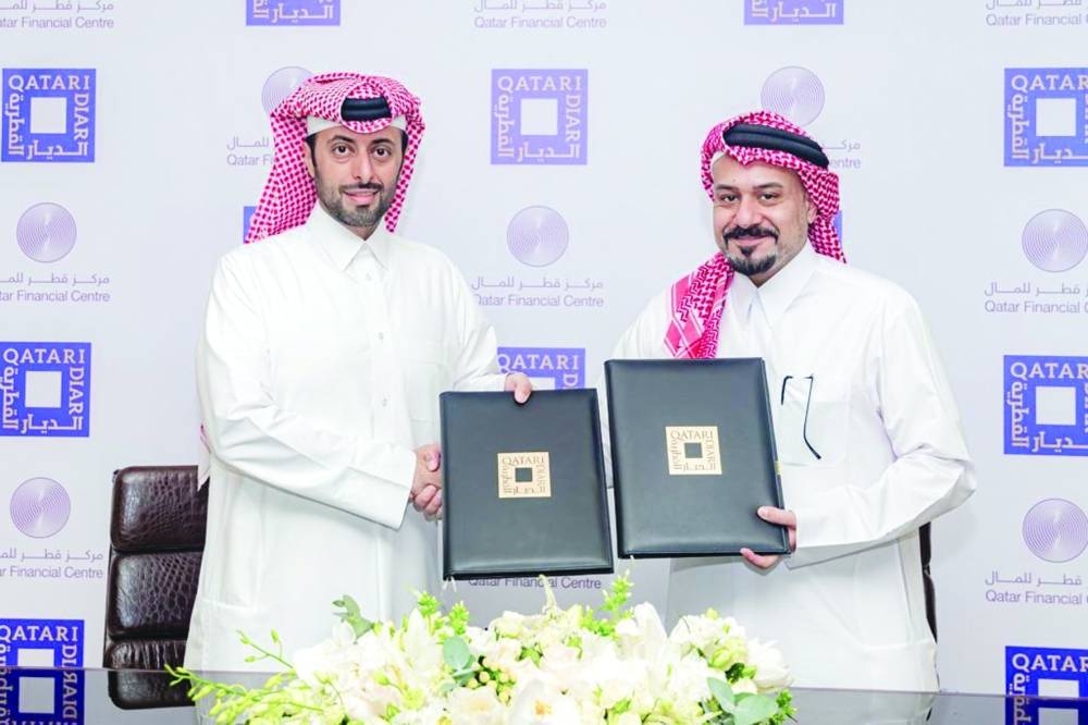Officials at the signing of the agreement