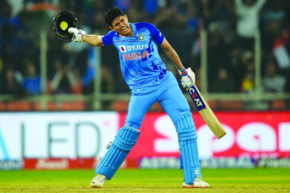 India’s Shubman Gill celebrates after scoring a century during the third Twenty20 against New Zealand in Ahmedabad. (AFP)