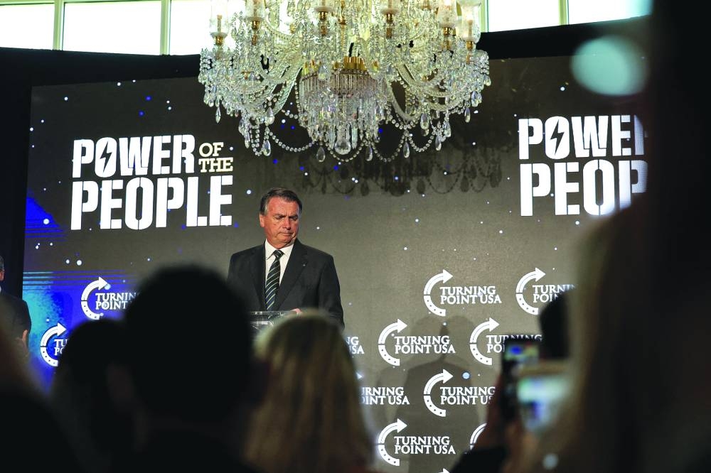 Jair Bolsonaro speaks during the Turning Point USA event at the Trump National Doral Miami resort on Friday in Doral, Florida. (AFP)