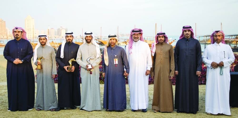 HE Prof Dr Khaled bin Ibrahim al-Sulaiti with the winners and others