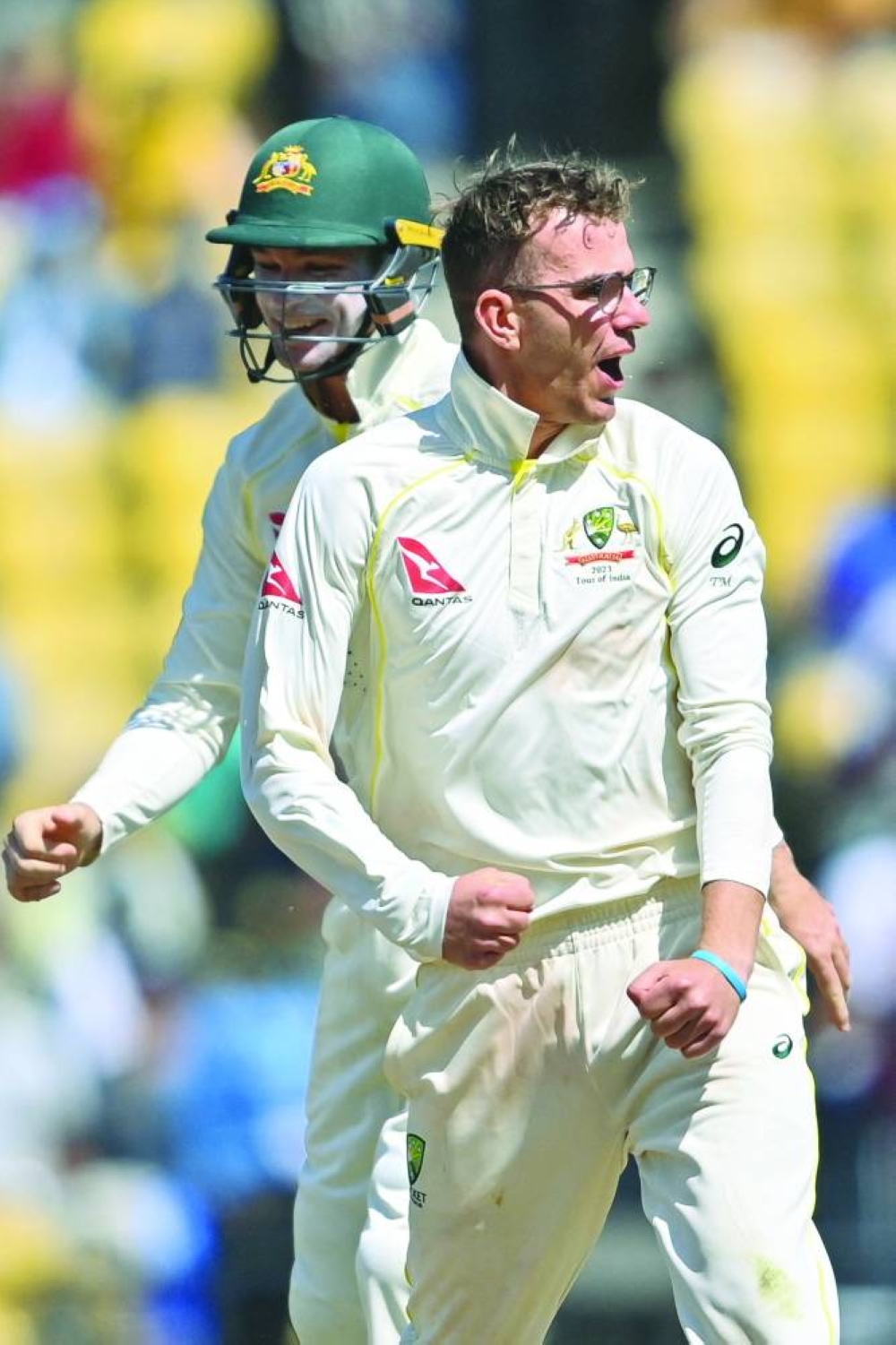 Australia’s Todd Murphy (right) celebrates after the dismissal of India’s Virat Kohli in Nagpur yesterday. (AFP)