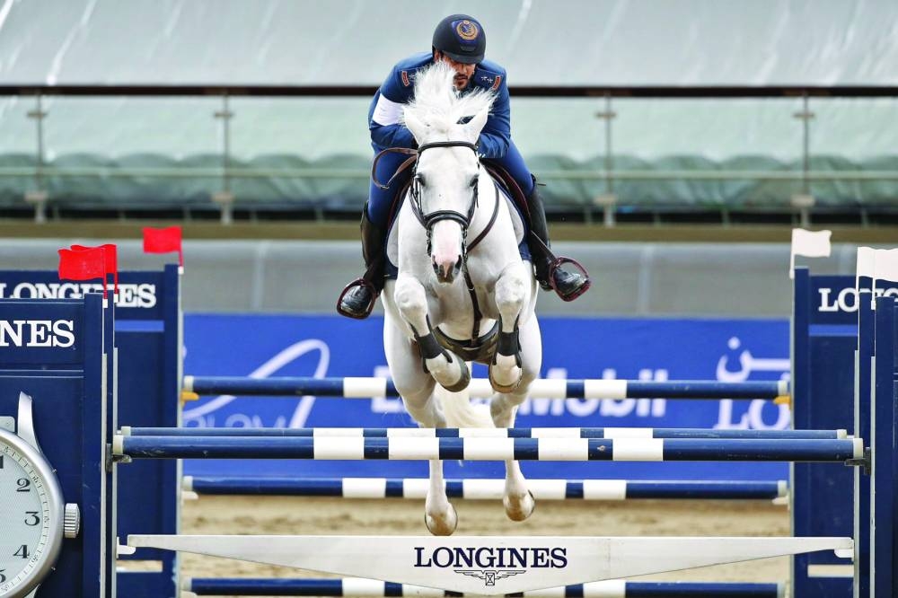 Mohamed Saeed Haidan in action with 15-year-old mare Miss Chili during the 10th round of the Longines Qatar Equestrian Tour Hathab at Al Shaqab on Friday.