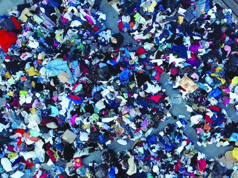 Volunteers sort through the donations, following an earthquake in Turkey, at Skopje city square, North Macedonia February 13. REUTERS