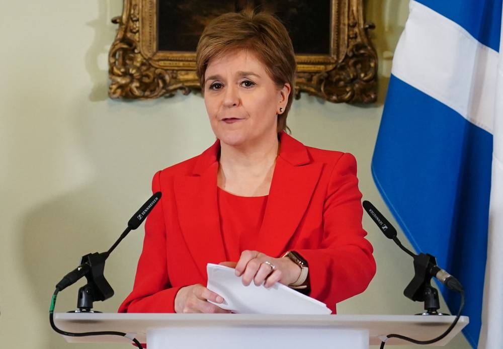 Scotland's First Minister, and leader of the Scottish National Party (SNP), Nicola Sturgeon, speaks during a press conference at Bute House in Edinburgh where she announced she will stand down as First Minister. (AFP)