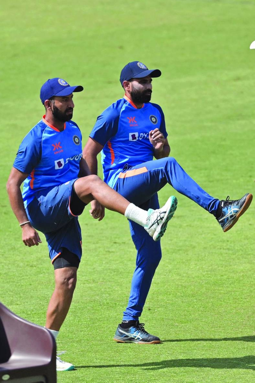 India’s Cheteshwar Pujara (left) and Mohamed Shami take part in a practice session at the Arun Jaitley Stadium in New Delhi yesterday. (AFP)
