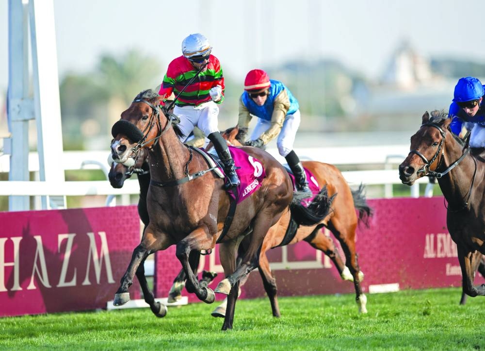 Italian jockey Alberto Sanna celebrates after guiding Russian Emperor to victory in the HH The Amir Trophy.