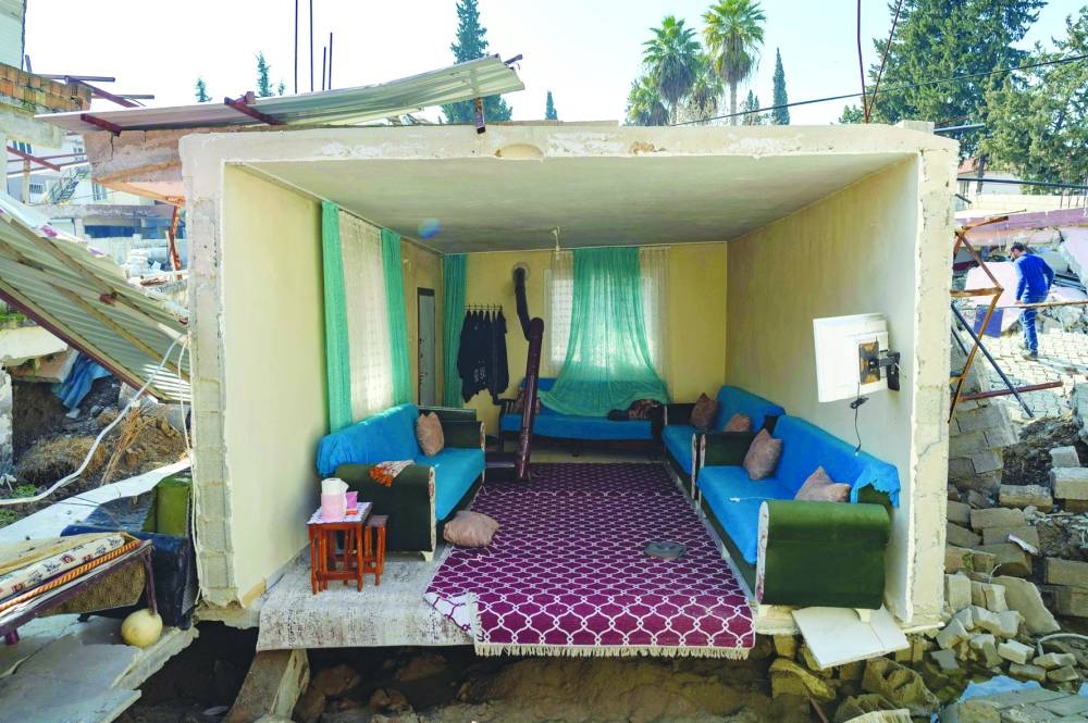 A view of a living room in Demirkopru, a small destroyed Turkish village now divided by a large crack in Hatay.