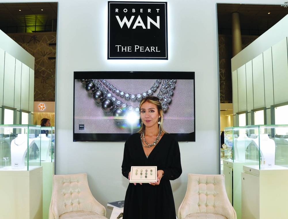 Wafa Habbar showcases Robert Wan's pieces. PICTURE: Shaji Kayamkulam