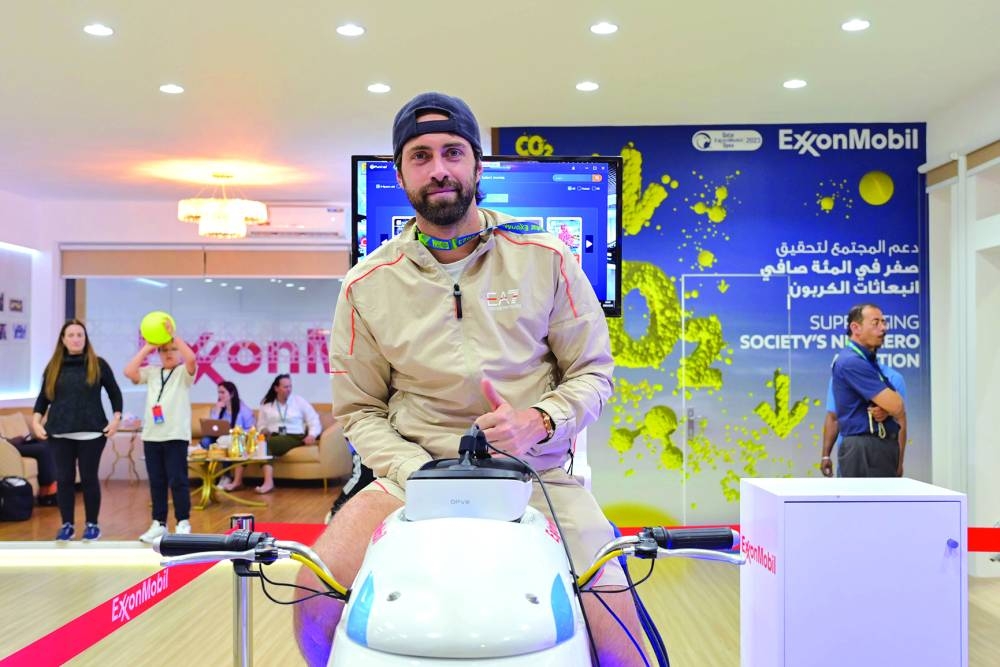 Nikoloz Basilashvili at ExxonMobil Qatar stand.