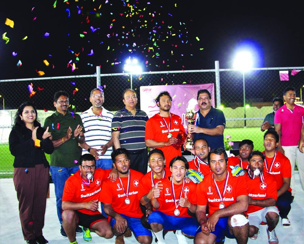 The winners with officials.