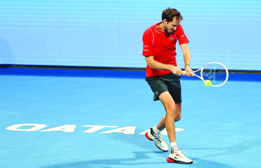 Daniil Medvedev of Russia essays a backhand shot against Christopher O’Connell during their quarter-final of the Qatar ExxonMobil Open on Thursday.