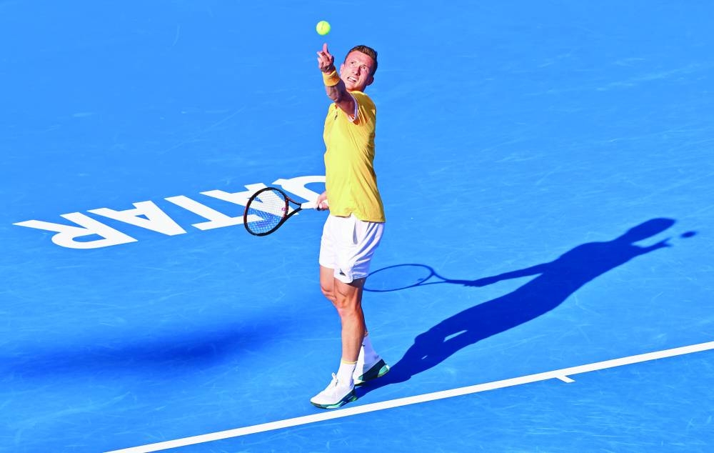 Jiri Lehecka of the Czech Republic serves against Andrey Rublev of Russia during their quarter-final of the Qatar ExxonMobil Open on Thursday.