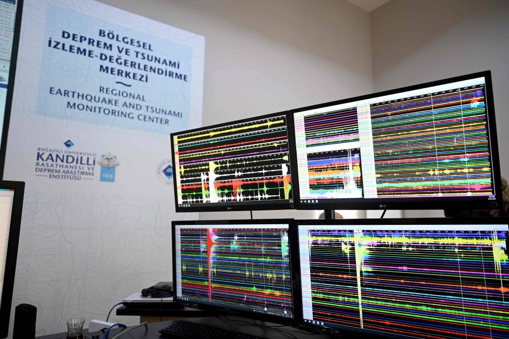 Screens display latest earthquake waves at the Kandilli Observatory’s Regional Earthquake-Tsunami Monitoring Center in Istanbul (AFP)