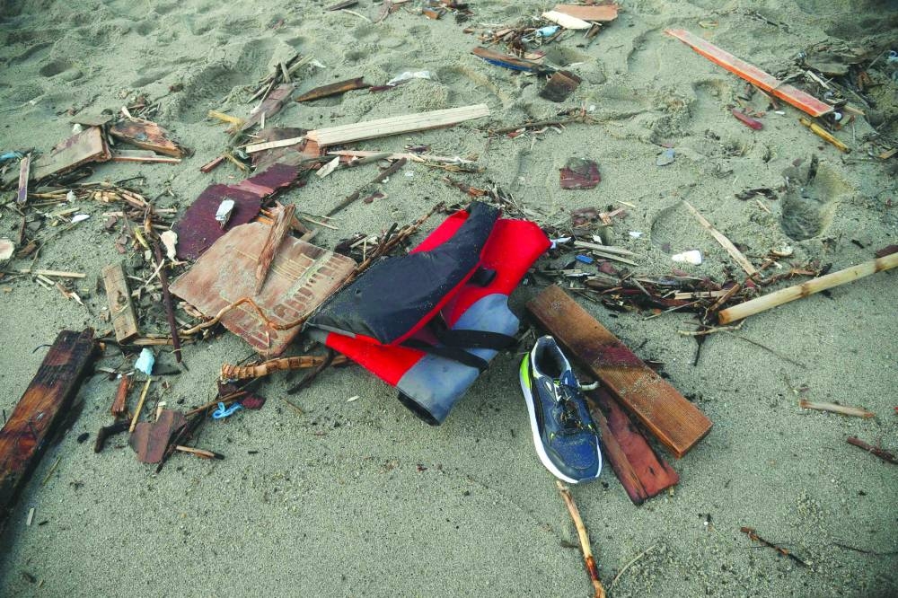Debris of the shipwreck washed ashore in Steccato di Cutro, south of Crotone, after the migrant boat sank off Italy’s southern Calabria region. (AFP,)