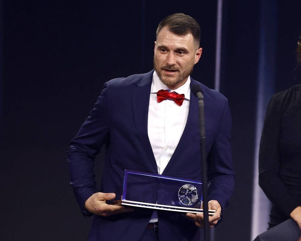 Marcin Oleksy, receiving the Puskas Award during the Best FIFA Football Awards.