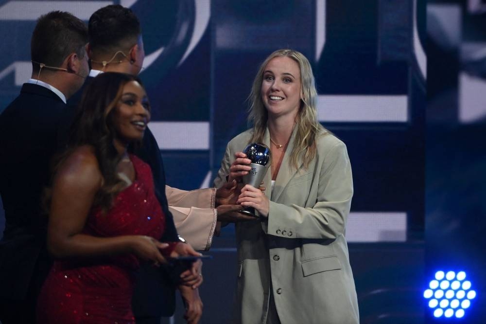 England and Arsenal forward Beth Mead receives an award for the FIFA FIFPRO women's World11.