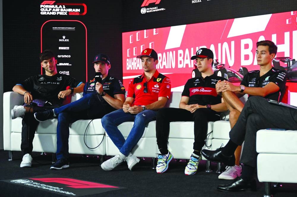 From Left: Alpine’s Pierre Gasly, Red Bull’s Max Verstappen, Ferrari’s Charles Leclerc, Alfa Romeo’s Zhou Guanyu and Mercedes’ George Russell attend a press conference at the Bahrain International Circuit in Sakhir yesterday, ahead of the Bahrain Formula One Grand Prix. (AFP)