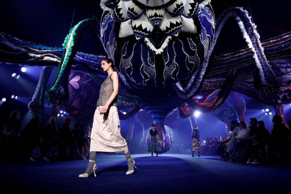 Models present creations by designer Maria Grazia Chiuri as part of her Fall-Winter 2023/2024 Women's ready-to-wear collection show for fashion house Dior during Paris Fashion Week in Paris, France, February 28, 2023. REUTERS/Benoit Tessier     TPX IMAGES OF THE DAY