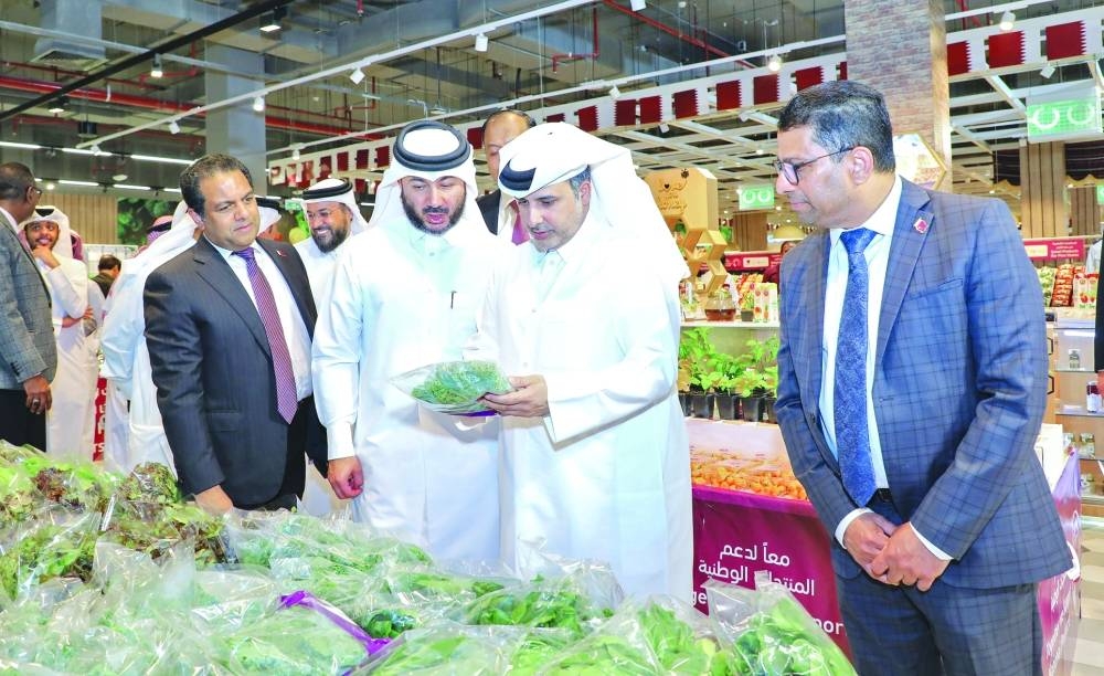 HE Dr Abdullah bin Abdulaziz bin Turki al-Subaie inspects some of the produce on display.