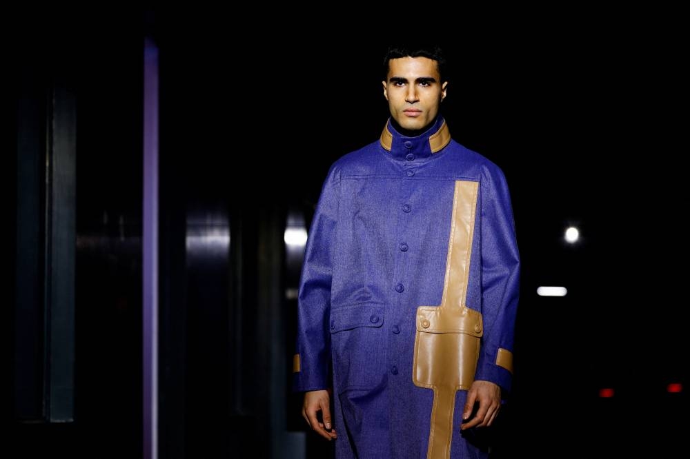 A model presents a creation of Pierre Cardin Fall-Winter 2023/2024 Women's ready-to-wear collection show during Paris Fashion Week in Paris, France, March 5, 2023. REUTERS/Sarah Meyssonnier