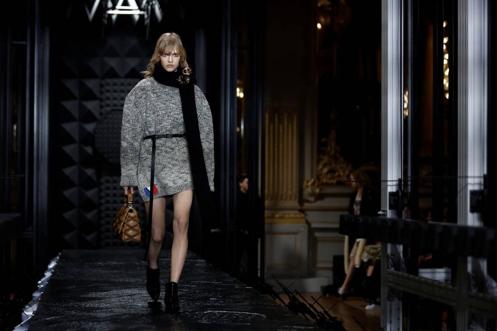 A model presents a creation by designer Nicolas Ghesquiere as part of his Fall-Winter 2023/2024 Women's ready-to-wear collection show for fashion house Louis Vuitton during Paris Fashion Week in Paris, France, March 6, 2023. REUTERS/Benoit Tessier