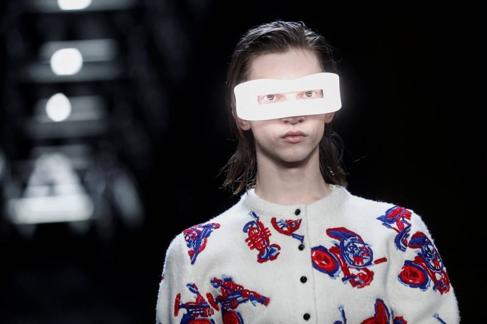 A model presents a creation by designer Nicolas Ghesquiere as part of his Fall-Winter 2023/2024 Women's ready-to-wear collection show for fashion house Louis Vuitton during Paris Fashion Week in Paris, France, March 6, 2023. REUTERS/Benoit Tessier