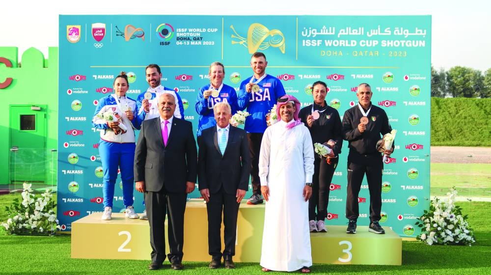 International Shooting Sport Federation (ISSF) Secretary-General Willi Grill, Qatar Shooting & Archery Association (QSAA) President Mishaal Ibrahim al-Nasr and President of the African and Egyptian Shooting Federation Major General Hazem Hosny with the podium winners of the mixed team skeet event at the Lusail Shooting Range on Wednesday.