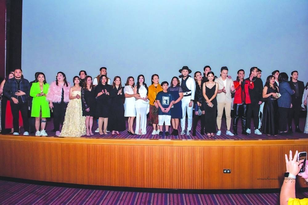 The film's cast with ambassador Lilibeth V Pono on stage.