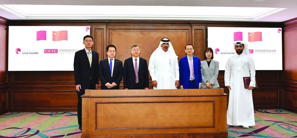Qatar Chamber first vice-chairman Mohamed bin Towar al-Kuwari and CFTC president Chu Shijia during a meeting between both officials at the chamber’s headquarters.