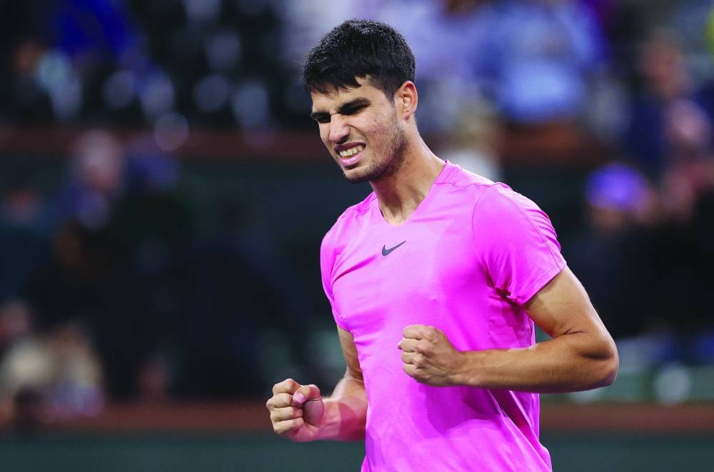Carlos Alcaraz of Spain celebrates after his win over Thanasi Kokkinakis of Australia in Indian Wells. (AFP)