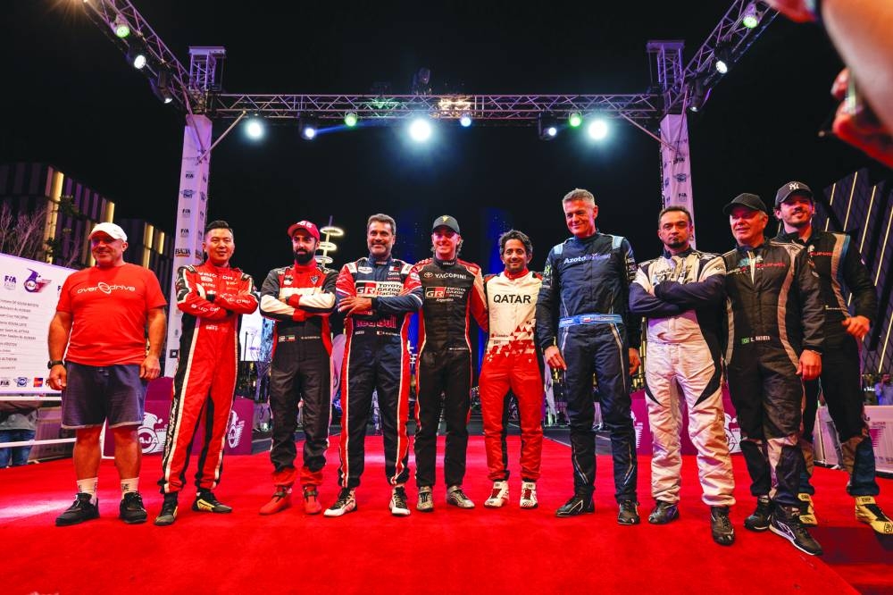 Qatar International Baja competitors pose after the ceremonial start at the Lusail Boulevard on Thursday evening. 
