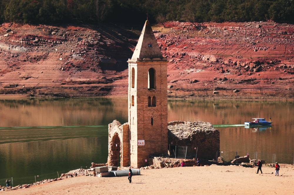 Church towers resurrected from dried-up reservoirs in drought-hit Spain