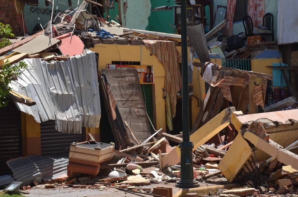 Destroyed buildings are seen after an earthquake in the city of Machala, Ecuador (AFP)