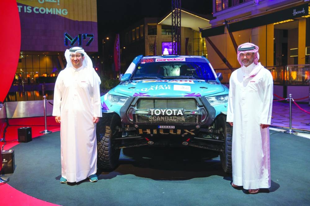 Ooredoo CEO Sheikh Ali bin Jabor al-Thani and Qatari rally champion Nasser al-Attiyah.