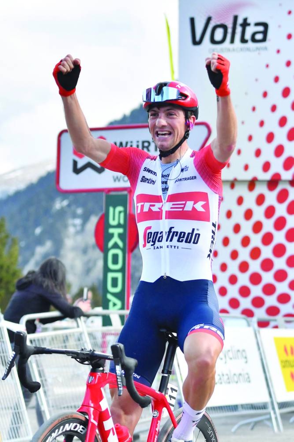 Team Trek-Segafredo’s Italian rider Giulio Ciccone celebrates as he crosses the finish line first during the 2nd stage of the 2023 Tour of Catalonia cycling race, covering a distance 165.5kms from Mataro to Vallter, yesterday. (AFP)