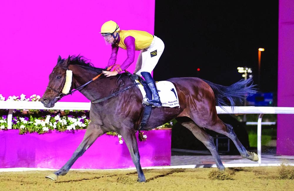 Jockey Lukas Delozier guides Ernest Aldrich to Al Jassasiya Cup victory.
