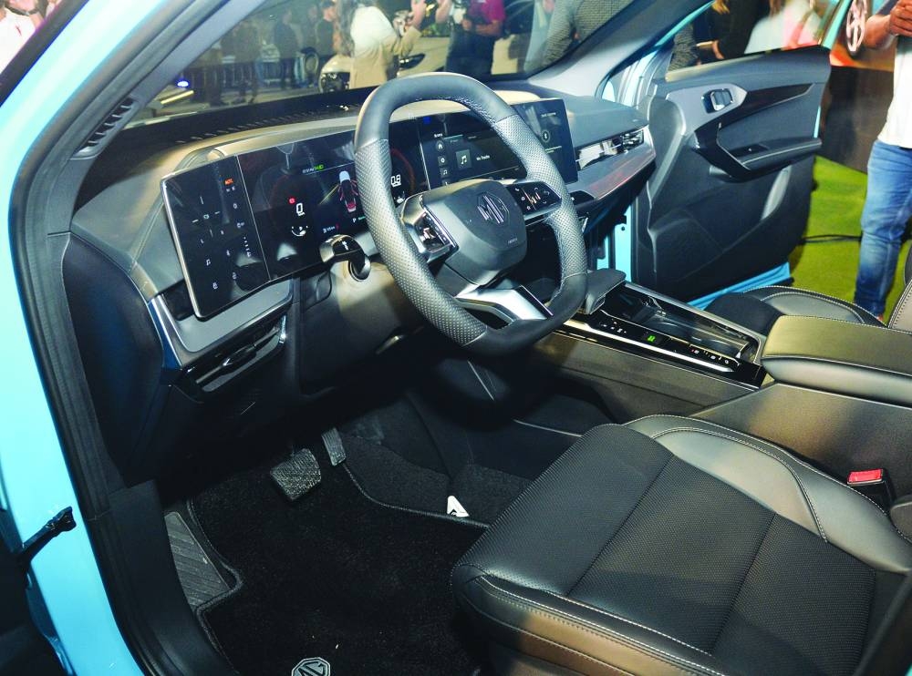 The spacious front interior of the car.