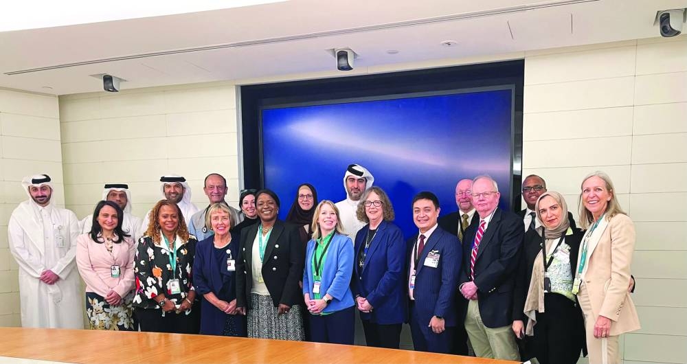 Members of the Sidra Medicine leadership and the JCI.