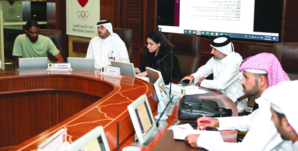Qatar Olympic Committee’s Athletes Committee General Assembly meeting was chaired by Secretary-General of the Commission Nada Mohamed Wafa (second left).