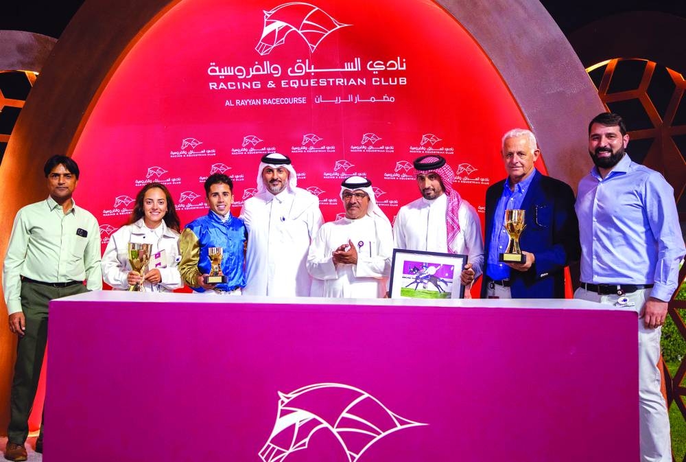 The connections of Matawar pose with their trophies at the Al Rayyan Racecourse on Thursday.
