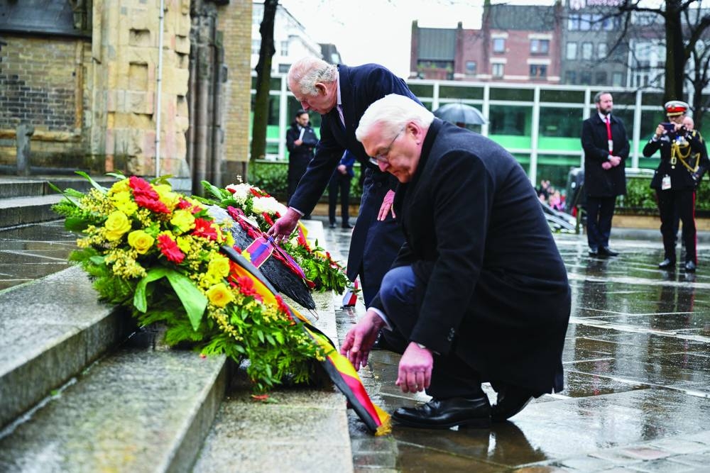 Britain's King Charles and German President Frank-Walter Steinmeier lay wreaths at St Nikolai church memorial dedicated to the victims of allied bombings during World War II in Hamburg, Germany, on Friday.