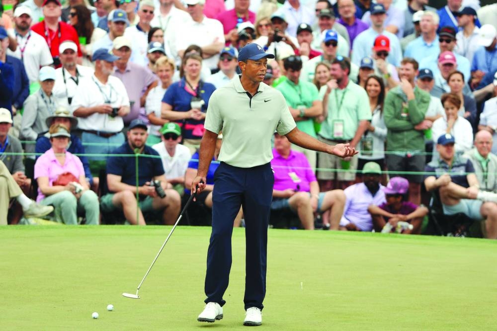 Tiger Woods of the United States looks over the ninth green during a practice round prior to the 2023 Masters Tournament at Augusta National Golf Club in Augusta, Georgia, yesterday. (AFP)