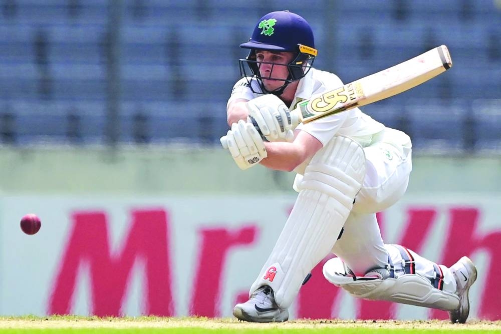 Ireland’s Lorcan Tucker plays a shot during the third day of the Test match against Bangladesh at the Sher-e-Bangla National Cricket Stadium in Dhaka on Thursday. (AFP)