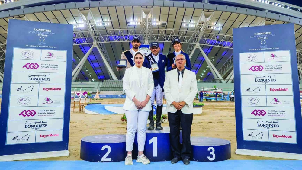 Medium Tour podium winners pose with Ahmed al-Bedoui, board member of the Hathab Tours committee; and Muneera al-Suwaidi, member of the judging committee.