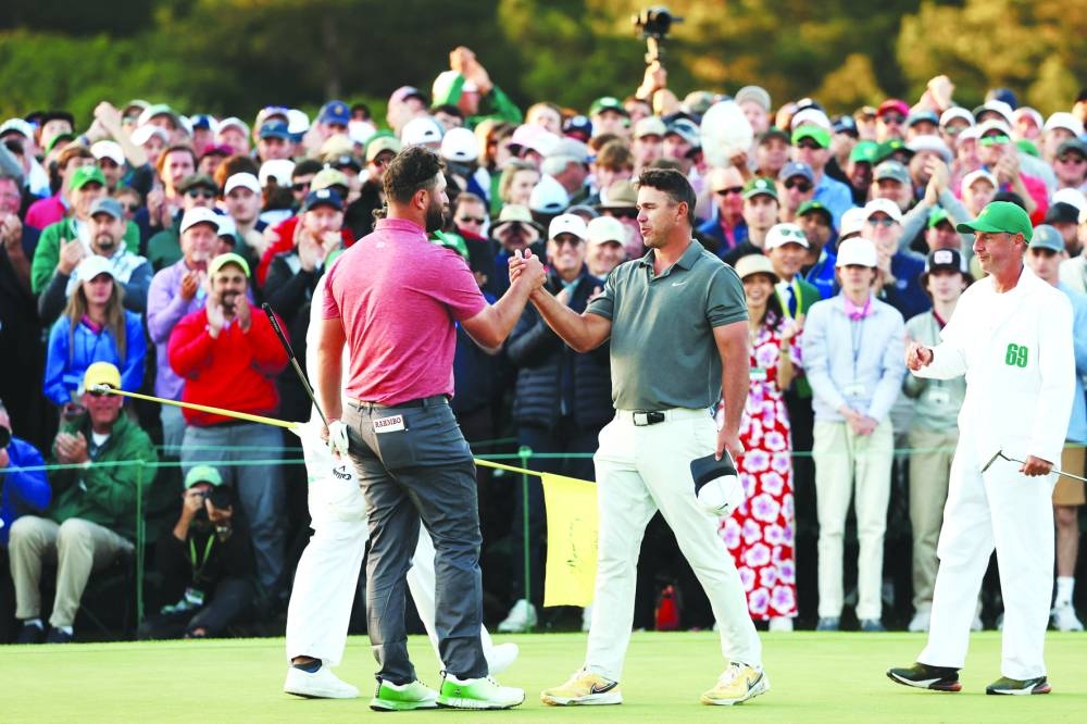Phil Mickelson of the US reacts to his birdie putt on the 18th green during the final round of the 2023 Masters. (AFP)