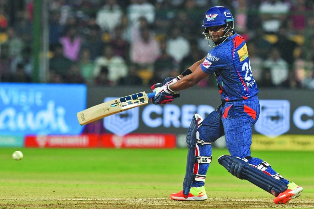 Lucknow Super Giants' Nicholas Pooran plays a shot during the IPL Twenty20 match against Royal Challengers Bangalore at the M Chinnaswamy Stadium in Bengaluru yesterday. (AFP)